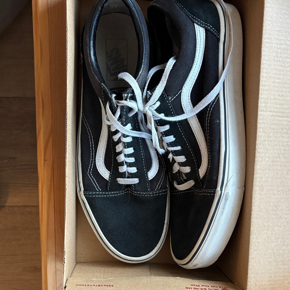 Vans Men's Black and White High-Top Sneakers